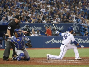 It's three strikes and you're out in Canada's beleaguered resource sector, says columnist.
Jose Bautista of the Toronto Blue Jays strikes out at Rogers Centre on Sept. 19, 2017, in Toronto.