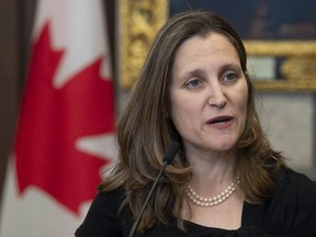 Deputy Prime Minister and Minister of Intergovernmental Affairs Chrystia Freeland speaks with the media before Question Period on Parliament Hill in Ottawa, Tuesday February 18, 2020.