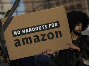 Activists and community members who opposed Amazon's plan to move into Queens rally in celebration of Amazon's decision to pull out of the deal, in the Long Island City neighborhood, February 14, 2019 in the Queens borough of New York City.