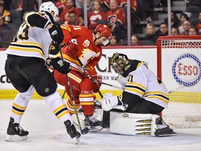 Bruins goalie Jaroslav Halak stops Calgary Flames Mikael Backlund in the third period at Scotiabank Saddledome on Friday, Feb. 21, 2020.