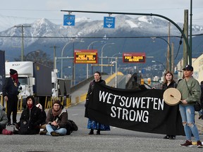 Supporters of the Wet'suwet'en Nation's hereditary chiefs block the entrance to the Port of Vancouver on Feb. 24, 2020.