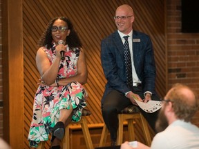 Jeff Loomis, executive director of Momentum, with  Pansie the Cake Lady, who is a graduate of the organization's Starting a Business course.