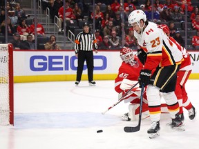 Flames Sean Monahan scores a first period goal past Jonathan Bernier of the Detroit Red Wings at Little Caesars Arena on Feb. 23, 2020 in Detroit.