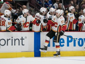 Feb 8, 2020; Vancouver, British Columbia, CAN;  Calgary Flames forward Milan Lucic (17) celebrates after scoring a goal against the Vancouver Canucks during the third period at Rogers Arena. Calgary won 6-2.  Mandatory Credit: Bob Frid-USA TODAY Sports ORG XMIT: USATSI-405846