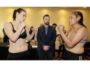 Calgary's Kandi Wyatt and Mexico's Beatriz Jimenez pose for a photo during weighs-in at the Deerfoot Inn & Casio prior to the Dekada card boxing competition. Friday, February 14, 2020. Brendan Miller/Postmedia