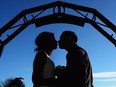 Michael Lewis and Rebecca Anderson kiss outside the Gretna Green Famous Blacksmiths Shop on the day of their wedding on Valentine's Day on Feb. 14, 2013, in Gretna, Scotland. Gretna Green is one of the most popular wedding destinations in Scotland.