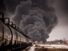 Smoke billows up from a derailed Canadian Pacific Railway train near Guernsey, Sask., on Thursday, Feb. 6, 2020.