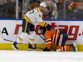 Edmonton Oilers captain Connor McDavid was injured on this play against the boards with Nashville Predators Dante Fabbro on Feb. 8, 2020.
