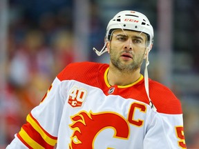 Calgary Flames Mark Giordano during warm-up before facing the Montreal Canadiens during NHL hockey in Calgary on Thursday December 19, 2019. Al Charest / Postmedia