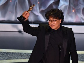 South Korean director Bong Joon-ho accepts the award for Best International Feature Film for "Parasite" during the 92nd Oscars in Hollywood on Feb. 9, 2020.