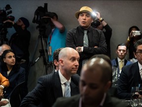 Will George, a member of the Tsleil-Waututh First Nation, stands to interrupt a speech by Prime Minister Justin Trudeau in Vancouver, on May 22, 2019. Opponents of the Trans Mountain pipeline expansion say they will do whatever it takes to stop the project after suffering a devastating legal blow at the Federal Court of Appeal. "If it has to get ugly, it will get ugly," said George.