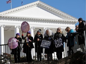 Activists calling for Virginia's adoption of the Equal Rights Amendment gather outside the Virginia State Capitol building as the General Assembly prepares to convene in Richmond, Virginia, January 8, 2020.