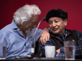 Environmental activist David Suzuki speaks to Grand Chief Stewart Phillip, President of the Union of B.C. Indian Chiefs, at a news conference in Vancouver on Feb. 20, 2020.