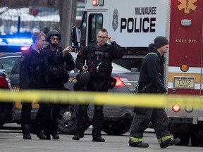 Police and emergency officials work at an active shooter scene at the Molson Coors headquarters in Milwaukee, Wisconsin, February 26, 2020.   Mark Hoffman/Milwaukee Journal Sentinel/USA TODAY NETWORK via REUTERS ORG XMIT: NYK998