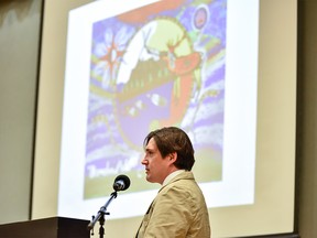 First Nations Artist Justin Ouellette, Rundle College alumni, speaks at the ceremony to represent the logo he has made for the Rundle College Rugby Club to wear in South Africa on Thursday, March 5, 2020. The team's trip to South Africa was supposed to take place this year but was postponed due to the Coronavirus spread to the year 2012.  Azin Ghaffari/Postmedia