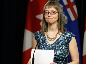 Alberta's chief medical officer of health Dr. Deena Hinshaw announced that the first death in Alberta from COVID-19 is an Edmonton man in his 60s as cases jump to 146 at a press conference at the Alberta Legislature, on Thursday, March 19, 2020. Photo by Ian Kucerak/Postmedia