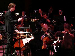 The Calgary Philharmonic Orchestra led by associate conductor Karl Hirzer.