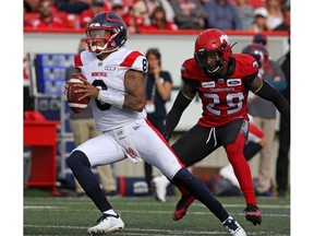 The Calgary Stampeders' Jamar Wall goes after  Montreal Alouettes quarterback Vernon Adams Jr. during CFL action at McMahon Stadium in Calgary on Saturday August 17, 2019.  Gavin Young/Postmedia