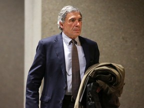 City of Calgary Integrity Commissioner Sal LoVecchio walks into a special closed council meeting on Wednesday, February 19, 2020. Council was meeting behind closed doors to discuss a possible forensic audit of Councillor Joe Magliocca's expenses. Gavin Young/Postmedia