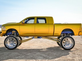 Police are looking to speak with anyone who may have seen a 2018 gold Dodge Ram being towed on a flatbed trailer. The stolen truck had custom gold paint on the exterior and with a blue frame and interior. The stolen truck had a number of after-market modifications including a noticeable lift.