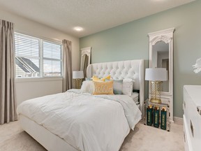 The master bedroom in the Spencer show home at Winston at Walden, by Avi Urban.