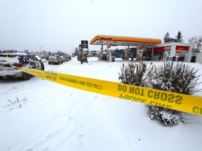 Police investigate at the scene of a suspicious death near a Shell service station at the corner of Bow Trail and 37th Street S.W. on Saturday, March 14, 2020.