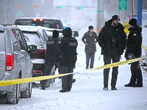 Police investigate the scene of a suspicious death near a Shell service station at the corner of Bow Trail and 37th Street SW on Saturday, March 14, 2020.