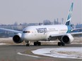 A WestJet Boeing 787 Dreamliner arrives in Calgary from London on Tuesday, March 17, 2020.