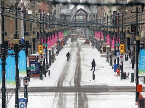 Stephen Avenue Mall was quiet in downtown Calgary on Thursday, March 19, 2020. The COVID-19 pandemic has left many businesses closed and office workers at home.  Gavin Young/Postmedia