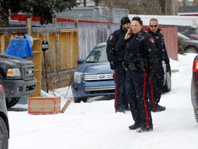 Calgary Police investigate after a woman found a baby in a back alley in the community of Ogden where it was rushed to hospital. The woman who found the baby could not remember what alley she found it in and had police searching the community in Calgary. Thursday, March 19, 2020. Darren Makowichuk/Postmedia