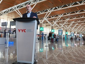 Calgary Airport Authority president and CEO Bob Sartor addresses the media on Monday, March 16, 2020.