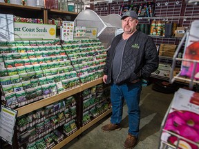 Meryl Coombs owner of Spruce it Up Garden Centre stands near vegetable seeds in the store on Wednesday, April 1, 2020. There has been a lot of interest from customers in gardening and growing their own food amidst the COVID-19 pandemic. Gavin Young/Postmedia