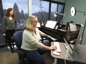 Heather Henderson-Hryhoriw, a vocal instructor with the Chinook School of Music, conducts a lesson as school executive director Carrie Kalmykov looks on.