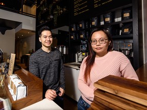 Vinh Tran and Cecile Lau at Deville Coffee shop on Friday, March 20, 2020.