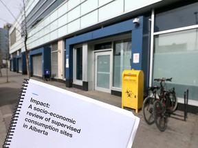 The Government of Alberta report on safe consumption sites in Alberta is shown in front of the Safeworks site in downtown Calgary on Thursday, March 5, 2020. Illustration by Jim Wells/Postmedia