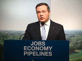 Alberta Premier Jason Kenney speaks in Calgary on Tuesday, March 31, 2020. Jim Wells/Postmedia