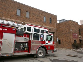 A piece of Calgary FIre Department apparatus from number one station is parked in front of number two station in downtown Calgary on  Tuesday, March 31, 2020.