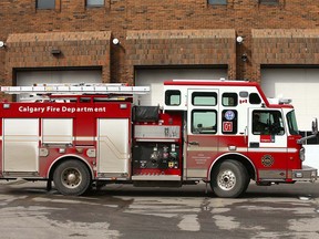 A piece of Calgary FIre Department apparatus from number one station is parked in front of number two station in downtown Calgary on  Tuesday, March 31, 2020. The fire department will be taking COVID-19 precautions by changing the way they organize their work shifts. Jim Wells/Postmedia