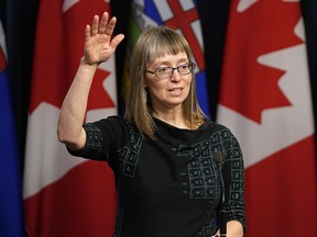 Dr. Deena Hinshaw, Alberta chief medical officer of health, delivers a COVID-19 update while wearing a dress emblazoned with the periodic table of elements.