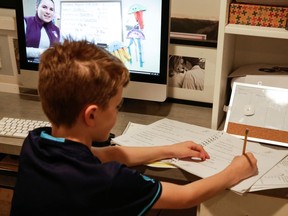 Students and teachers are all adjusting to learning at home. Many fear the layoff of educational assistants will make it more difficult. REUTERS/Jason Redmond