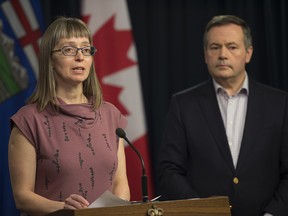 Dr. Deena Hinshaw, chief medical officer of health, and Premier Jason Kenney give an update on COVID-19 in Alberta at a press conference in Edmonton on Sunday, March 15, 2020.