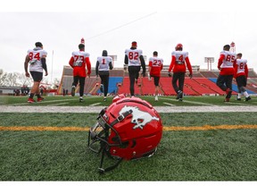 Calgary Stampeders players warm-up during training camp at McMahon Stadium on Tuesday, May 21, 2019. Gavin Young/Postmedia