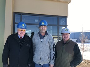 Hardy Nielsen, president; Chris Luzi, site superintendent; and Kevin Deeks, managing broker, of Norcal Group at its new Airways Crossing building.