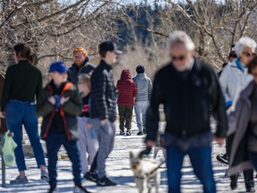 The Bow River pathway was crowded on Sunday, March 22, 2020.