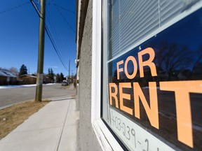 A for rent sign is seen outside a house in the community of Sunnyside in Calgary on Thursday, March 26, 2020.