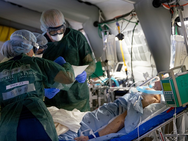  Medical staff tend to COVID-19 patients at the Samaritan’s Purse emergency field hospital in Cremona, Italy.
