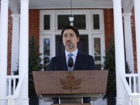 Justin Trudeau, Canada's prime minister, speaks during a news conference in front of Rideau Cottage in Ottawa, Ontario, Canada, on Wednesday, March 18, 2020. Photographer: David Kawai/Bloomber ORG XMIT: 775497521