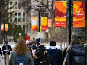 People move through the University of Calgary campus on Wednesday, March 11, 2020.
