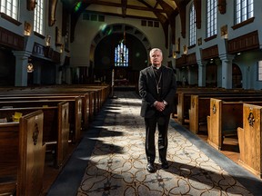 Bishop McGrattan poses for a photo in Saint Mary's Cathedral in Calgary on Wednesday, April 8, 2020. Azin Ghaffari/Postmedia
