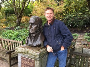 Red Deer-based sculptor Stephen Harman with the bust of Archibald Menzies, which his father created in 1972. Photo submitted.